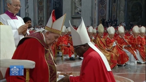Archbishop Paul Ssemogerere of Kampala Archdiocese receives his Pallium from the Holy Pope Francis.